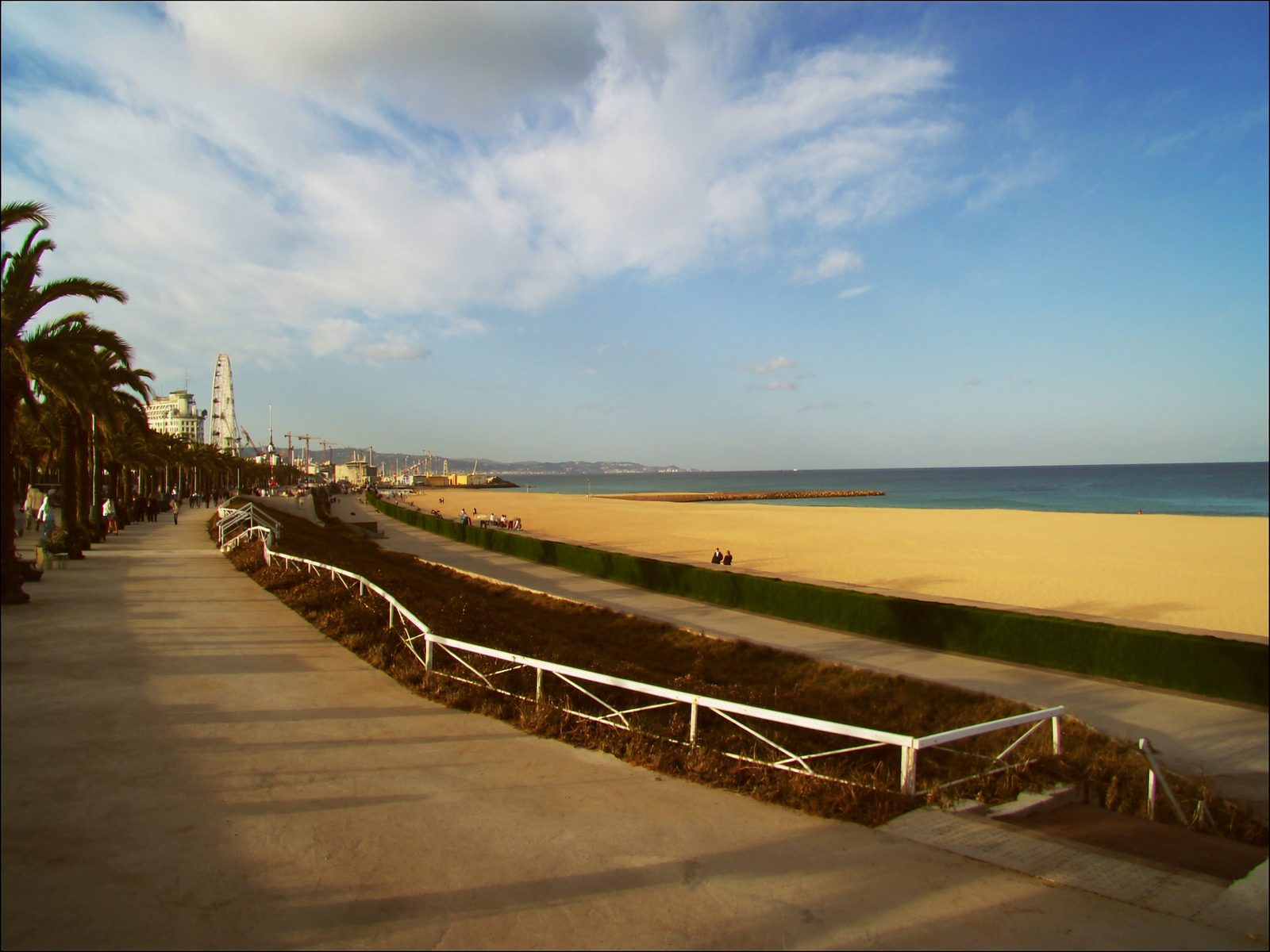 Barceloneta beach with golden sand and the Mediterranean sea in Barcelona