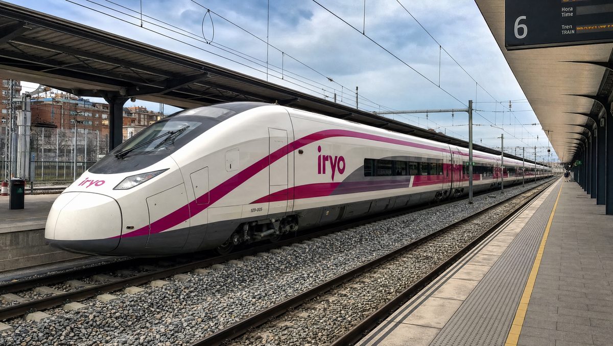 Real Iryo high-speed train with pink diagonal accent livery